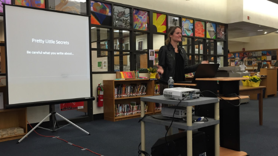 Author Sara Shepard speaking to students in the media center on Oct. 28th