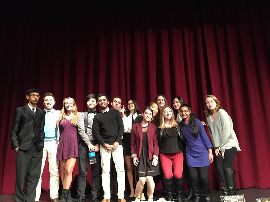 The debate team poses for one last picture before its senior members graduate.