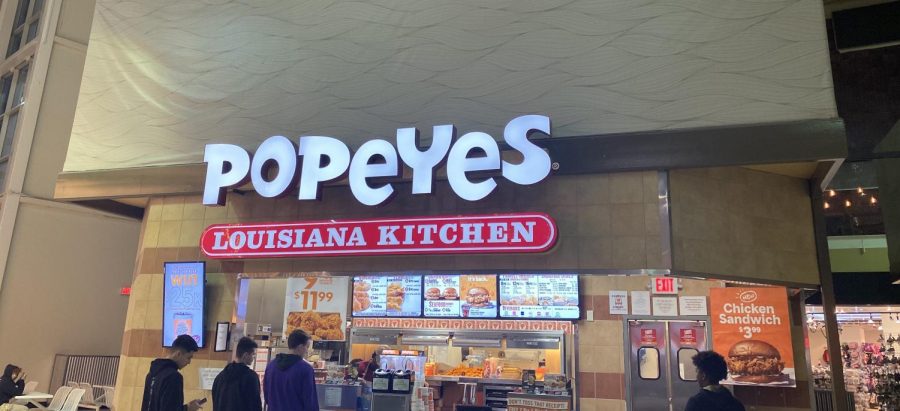 Lines form in front of Popeyes as customers wait for chicken sandwiches