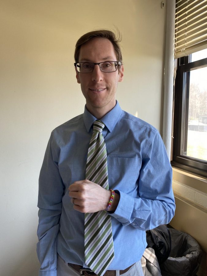 Dr. Nicholas Pellegrino shows off a tri-color bracelet