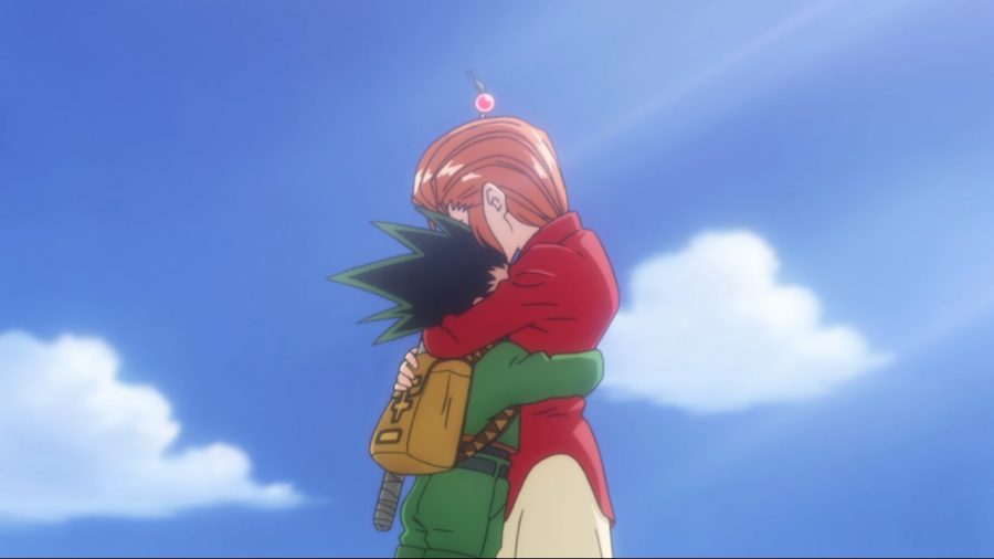 Gon hugs his caretaker, Mito, goodbye as he sets off to take the Hunter Exam.