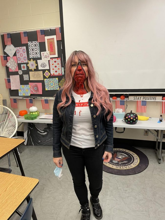 Mrs. Fernandez shows off her classic gory costume.