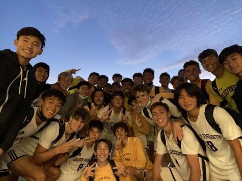 The boys pose for a group picture after their title-winning game.