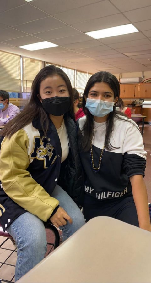 Jiye Shin (left) and Siddhi Samant (right) rep school colors for Blue and Gold Day.