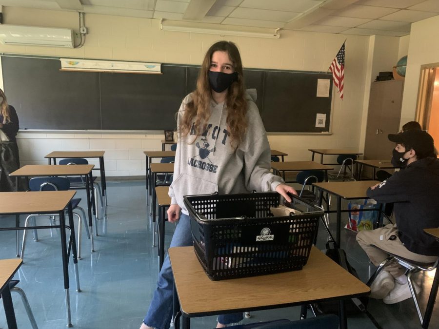 Senior Brielle Kaiser swaps her backpack for a Shop Rite basket.