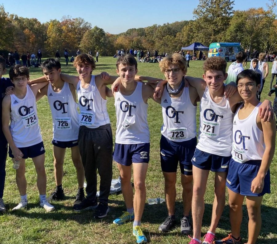 The boys cross country varsity lineup, from left: McGreevy, senior Nicholas Eng, Symons, Leocata, Malora, Connell, and Trinidad. 