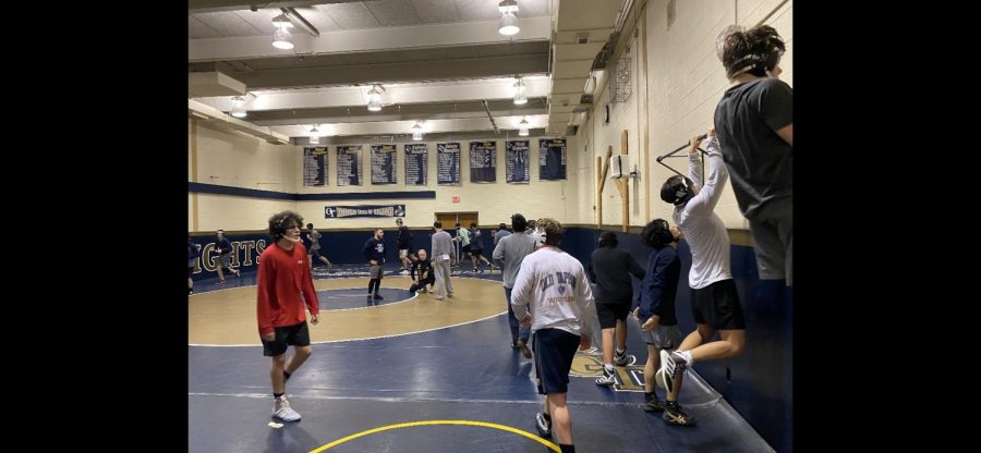 The wrestling team during their practice.