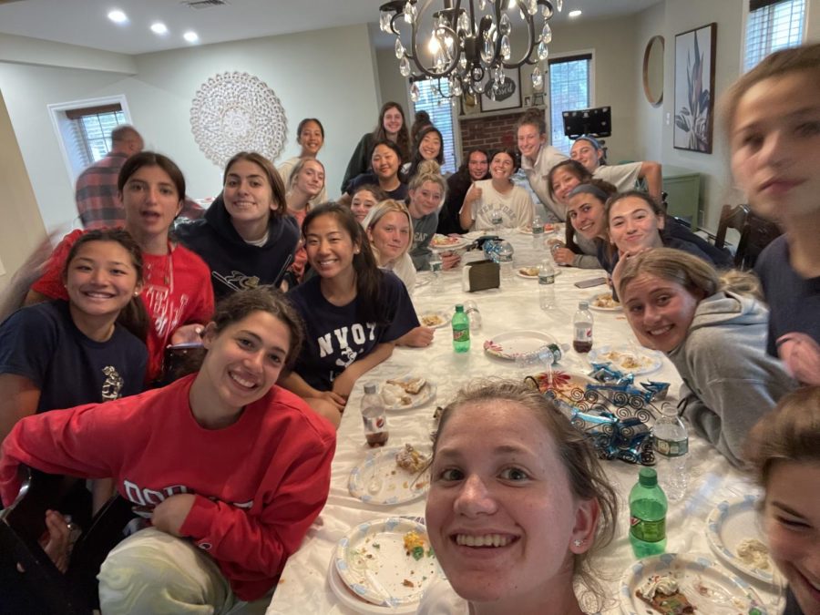 The team at a pasta dinner before their game.