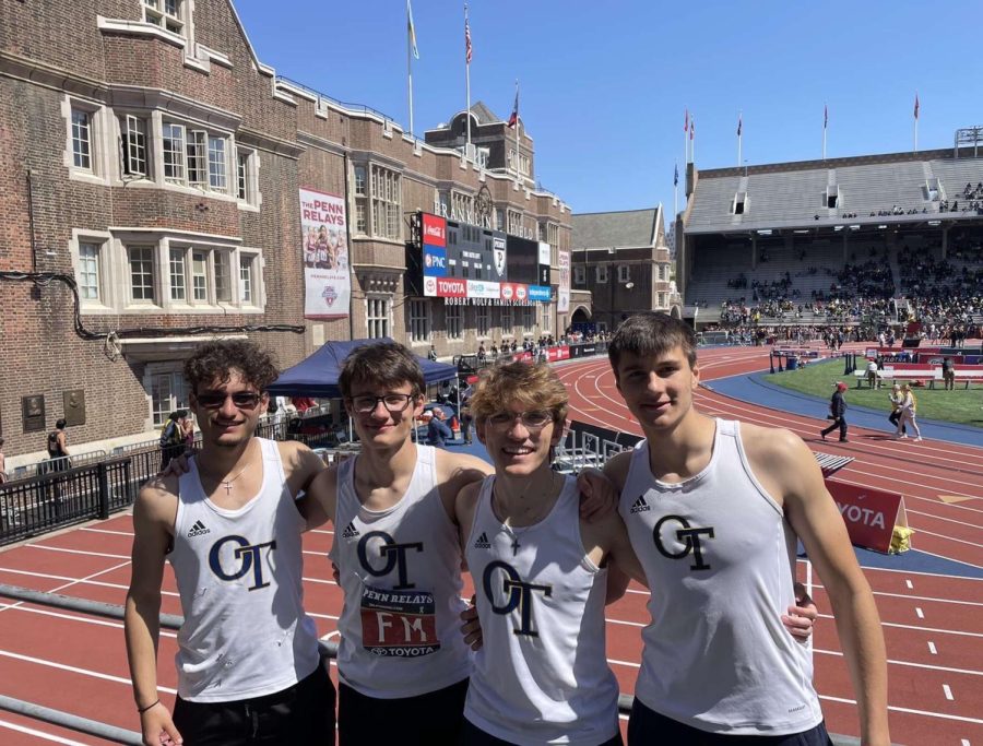 The boys 4x400m relay team poses at Penn Relays.