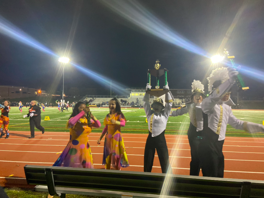 The marching band celebrates first place victory