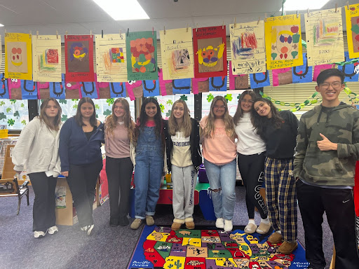 NVOT students involved in the art club have been teaching the kids basic ways to create art. 
