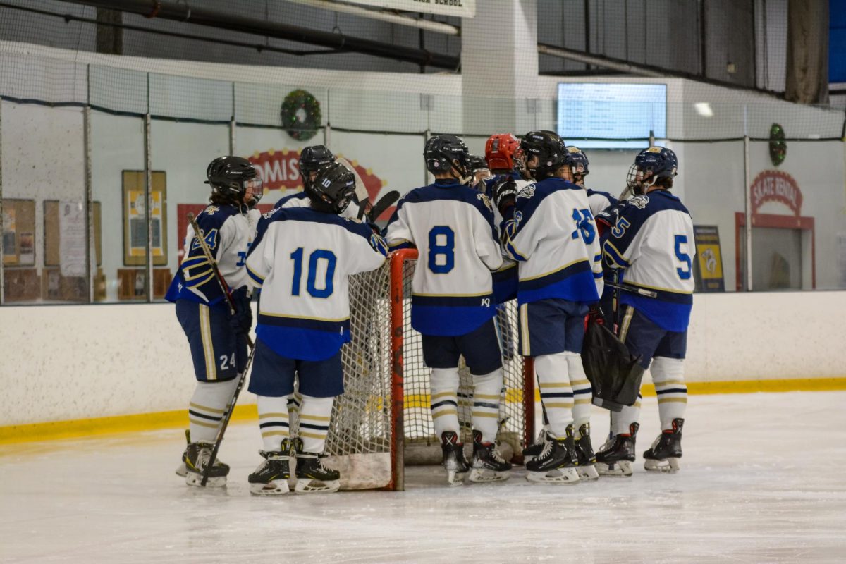 NV Puck team huddled up before the game 