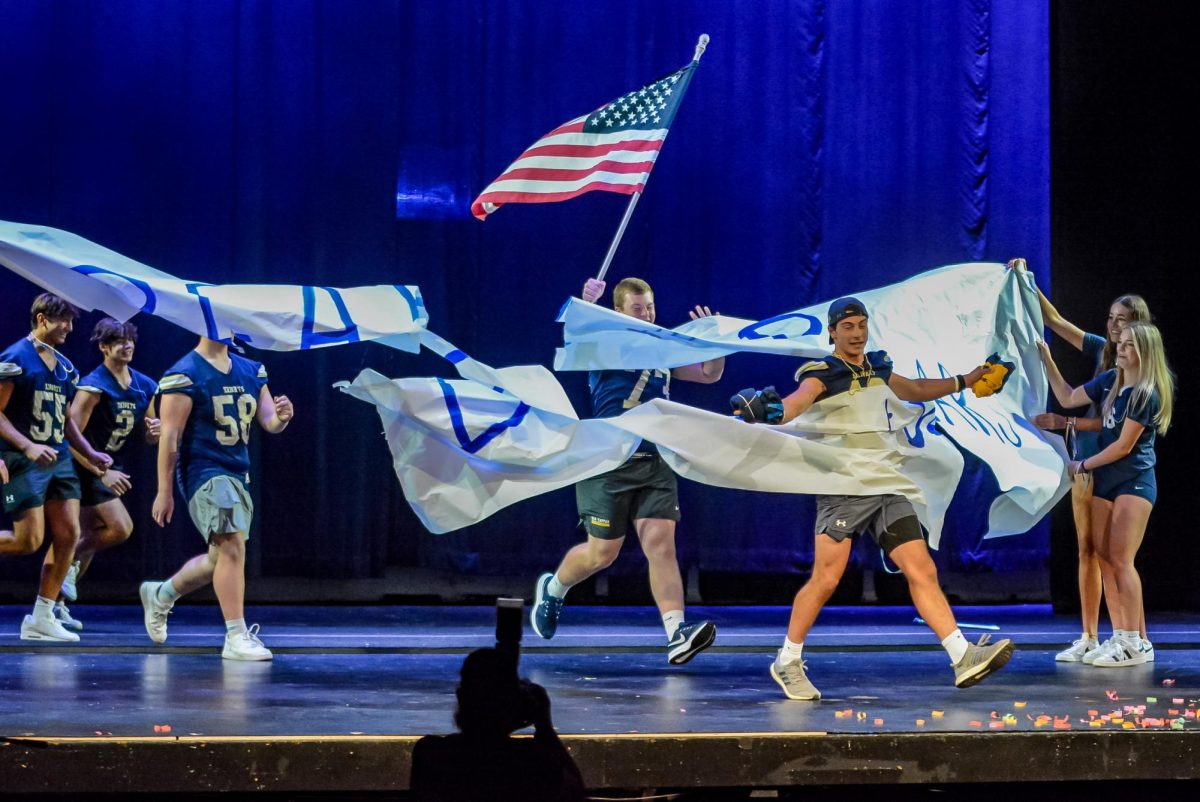 Football team entering stage