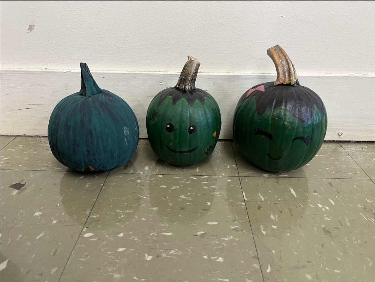 Pumpkins by Jelena Paljan, Annabelle Lee, and Madison Kosmark (respectively).