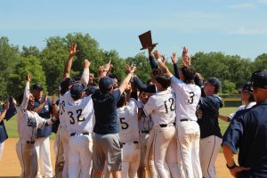 Team celebrate after receiving the plaque.
