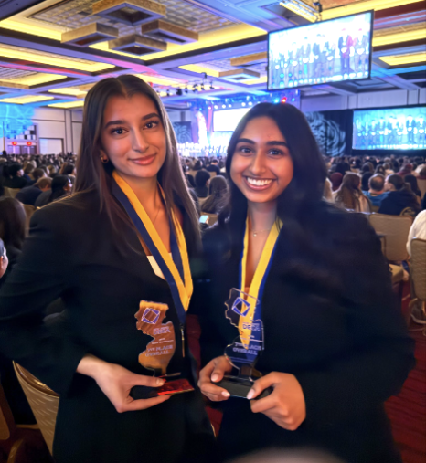 Anoo and Damwani posing after qualifying for Nationals